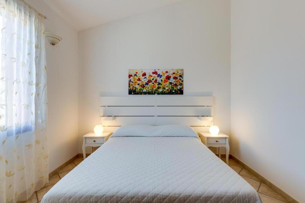 La Casa Delle Zie - Cabras Villa Luaran gambar